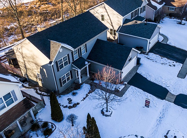 An aerial photo made with a drone shows a house for sale in Round Lake Heights, Illinois, USA, 21 January 2021.
Mandatory Credit:	Tannen Maury/EPA-EFE/Shutterstock