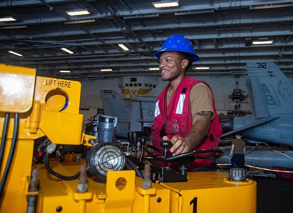 220729-N-DN159-1027 MEDITERRANEAN SEA (July 29, 2022) Aviation Ordnanceman Airman, Keandre Smith, from Houston, operates a forklift