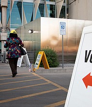 Voters enter Burton Barr Central Library to cast their ballots on November 3, 2020, in Phoenix, Arizona. August 2 is primary election day in Arizona, Kansas, Michigan, Missouri and Washington.
Mandatory Credit:	Courtney Pedroza/Getty Images