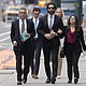 Lawrence Rudolph's defense investigator, left, heads into federal court in Denver along with the dentist's children. Rudolph, a dentist and big-game hunter, was found guilty of murder in the shooting death of his wife on an African safari on August 2.
Mandatory Credit:	David Zalubowski/AP