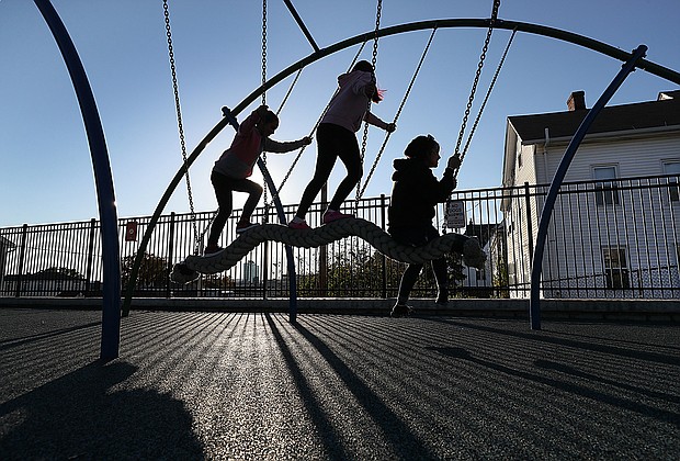 A medical analyst explains what precautions families should take as children return to school.
Mandatory Credit:	Suzanne Kreiter/The Boston Globe/Getty Images