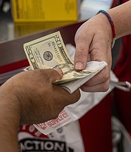 Congressional Democrats' climate and health care package is getting a boost from a group of top economists, who wrote in a new letter that the so-called Inflation Reduction Act will lower prices for American consumers amid high inflation.
Mandatory Credit:	David Paul Morris/Bloomberg/Getty Images