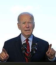 President Joe Biden speaks from the Blue Room Balcony of the White House on August 1 in Washington.
Mandatory Credit:	Jim Watson/Pool/Getty Images