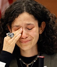 Victoria Gonzalez, who has been called Joaquin Oliver's girlfriend but said they called themselves "soulmates," wipes away tears as she gives her victim impact statement during the penalty phase of Marjory Stoneman Douglas High School shooter Nikolas Cruz.
Mandatory Credit:	Amy Beth Bennett/South Florida Sun Sentinel via AP