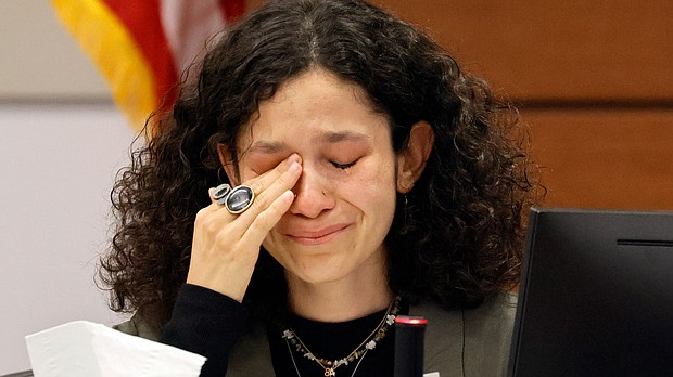 Victoria Gonzalez, who has been called Joaquin Oliver's girlfriend but said they called themselves "soulmates," wipes away tears as she gives her victim impact statement during the penalty phase of Marjory Stoneman Douglas High School shooter Nikolas Cruz.
Mandatory Credit:	Amy Beth Bennett/South Florida Sun Sentinel via AP
