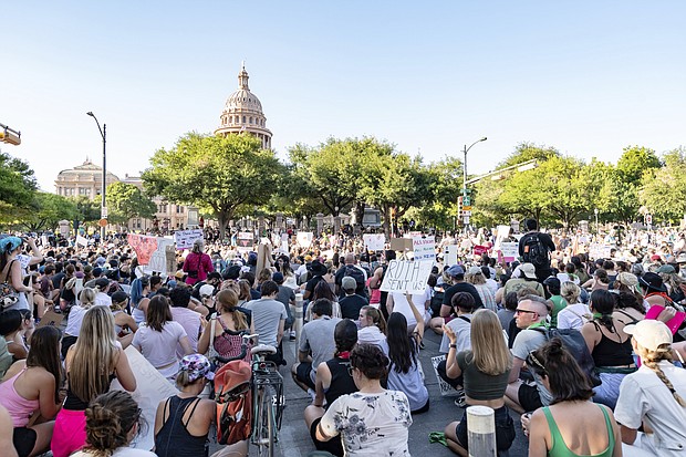 Abortion rights demonstrators protest the US Supreme Court's decision on June 24, in Austin, Texas. In more than a dozen states, legal fights are underway over abortion bans and other laws that greatly limit the procedure after the US Supreme Court ended a constitutional right to an abortion on June 24.
Mandatory Credit:	Maggie Boyd/Sipa/AP