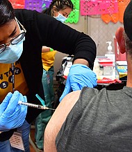 Both Pfizer and Moderna are working on bivalent booster vaccines made up of both the old formula and a new one that targets the Omicron BA.4 and BA.5 subvariants of the coronavirus.
Mandatory Credit:	Frederic J. Brown/AFP/Getty Images