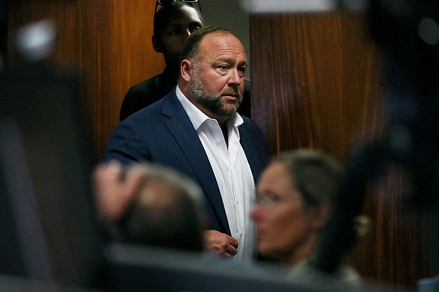 Right-wing talk show host Alex Jones will have to pay the parents of a Sandy Hook shooting victim a little more than $4 million in compensatory damages, a jury decided on August 4. Jones is seen here at the Travis County Courthouse in Austin, Texas on July 28.
Mandatory Credit:	Briana Sanchez/Pool/Reuters