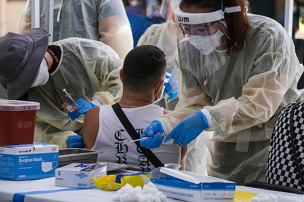 A healthcare worker is seen here preparing the monkeypox vaccine in Los Angeles in July. The US Department of Health and Human Services waited more than three weeks after the first confirmed case of monkeypox in the US to order bulk stocks of the vaccine in fear they may lose years of shelf life.
Mandatory Credit:	Ringo Chiu/AP/FILE