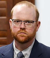 Travis McMichael, one of the three White men convicted in the killing of Ahmaud Arbery, was sentenced August 8 to life in prison plus 10 years after his federal convictions this year on interference with rights -- a hate crime -- along with attempted kidnapping and weapon use charges.
Mandatory Credit:	Octavio Jones/Pool/Getty Images