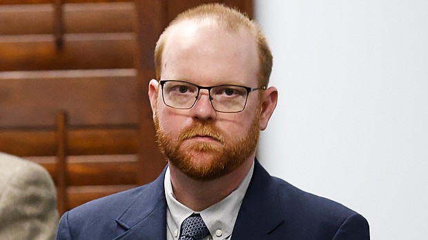 Travis McMichael, one of the three White men convicted in the killing of Ahmaud Arbery, was sentenced August 8 to life in prison plus 10 years after his federal convictions this year on interference with rights -- a hate crime -- along with attempted kidnapping and weapon use charges.
Mandatory Credit:	Octavio Jones/Pool/Getty Images