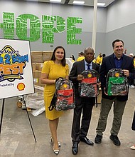 Mayor Sylvester Turner (second from left) stands with Olivera Jankovska, Brian Greene, and Christina Jones.