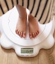 Sometimes the best way to talk about weight with kids is to avoid talking about weight at all, experts said.
Mandatory Credit:	Adobe Stock