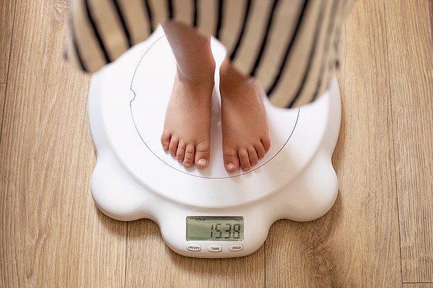 Sometimes the best way to talk about weight with kids is to avoid talking about weight at all, experts said.
Mandatory Credit:	Adobe Stock