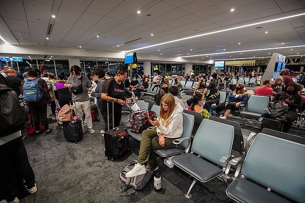 Travelers wait for their flight at Los Angeles International Airport. According to the flight tracking website, FlightAware, there have been 200 flights canceled so far on August 8. On August 7, 950 flights were canceled.
Mandatory Credit:	Michael Ho Wai Lee/SOPA Images/Sipa