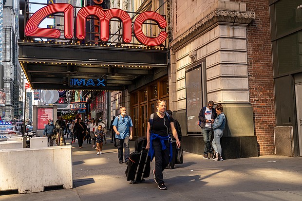 Shares of movie theater chain AMC, video game retailer GameStop and struggling home furnishings retailer Bed Bath & Beyond soared on August 8, extending the prior week's big gains. The AMC Empire 25 Cinemas in Times Square is pictured here in May.
Mandatory Credit:	Richard B. Levine/ZUMA Press