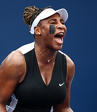 Williams celebrates in her match against Párrizas Díaz -- her first singles win in 430 days.
Mandatory Credit:	Vaughn Ridley/Getty Images North America/Getty Images
