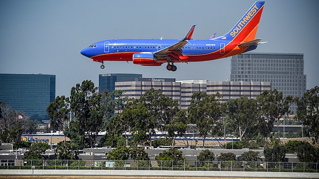 A Southwest Airlines flight attendant suffered a back injury in July after the plane’s hard landing, according to the National Transportation Safety Board. A Southwest jet is pictured at John Wayne Airport in 2017.
Mandatory Credit:	Jeff Gritchen/Digital First Media/Orange County Register/Getty Images