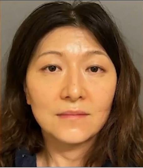 Irvine dermatologist, Yue Yu, was caught on a hidden camera pouring drain cleaner into her husband's cup on at least three separate occasions, court documents allege.
Mandatory Credit:	Irvine Police/KABC
