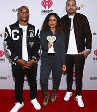 Charlamagne tha God, Angela Yee, and DJ Envy, seen here in California in 2020, have been co-hosts of "The Breakfast Club" for 12 years. Yee is departing the show to host her own radio show.
Mandatory Credit:	Tommaso Boddi/Getty Images for iHeartMedia