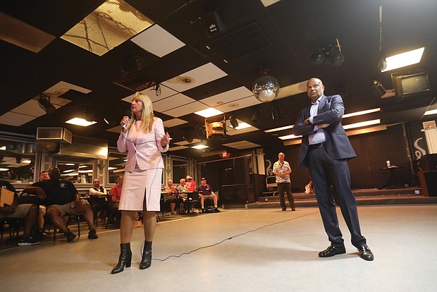 Alfred Liggins, CEO of Urban One, right, listens during a meeting hosted by 8th District Councilwoman Reva Trammell, left, at The Satellite Restaurant & Lounge on Aug. 4. Urban One wants the City of Richmond to focus on a casino referendum for 2023.