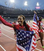 Sanya Richards-Ross, front center, and Allyson Felix, back left, celebrate winning gold in the women’s 4x400 meter relay final during the athletics in the Olympic Stadium at the Summer Olympics in London in 2012. Ms. Richards-Ross revealed that two weeks before the 2008 Beijing Olympics, she had an abortion while in a relationship with her then-fiancé Aaron Ross.