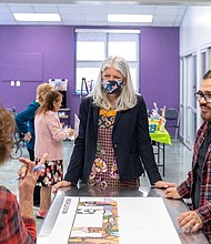 Artist David Maldonado with Council Member Karla Cisneros and Denver Harbor community members
