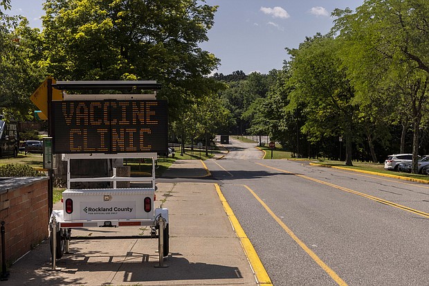 A sign guides drivers to a vaccine clinic at the Rockland County health department, in Pomona, New York, on July 22. New York Health officials are offering pop-up polio vaccinations and urging the public to get the shots.
Mandatory Credit: Victor J. Blue/The New York Times/Redux