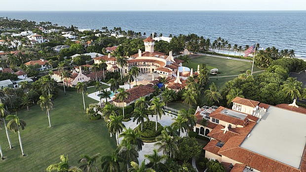 Federal investigators served an earlier grand jury subpoena and took away sensitive national security documents from former President Donald Trump's property in June. Trump's Mar-a-Lago estate is pictured on August 10.
Mandatory Credit:	Steve Helber/AP