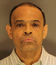 Shaun Harrison, a former Boston school dean, pleaded guilty to racketeering charges on August 9.
Mandatory Credit:	Suffolk County District Attorney