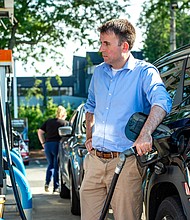 Gas prices fall below $4 for the first time in months. A driver pumps gas into their vehicle at a gas station in Lynnfield, Massachusetts, on July 19.
Mandatory Credit:	Joseph Prezioso/AFP/Getty Images