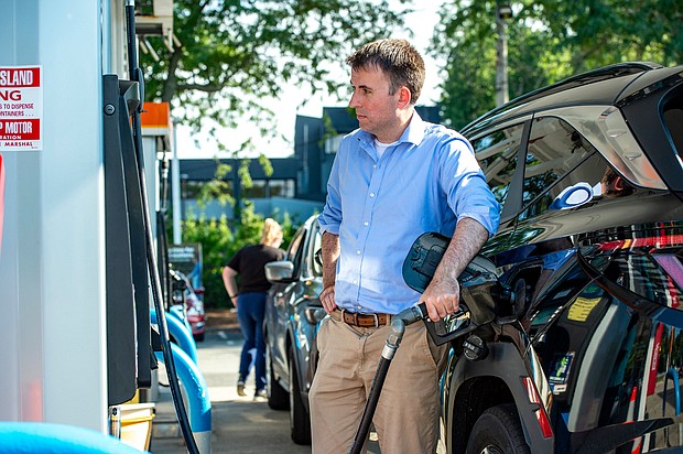 Gas prices fall below $4 for the first time in months. A driver pumps gas into their vehicle at a gas station in Lynnfield, Massachusetts, on July 19.
Mandatory Credit:	Joseph Prezioso/AFP/Getty Images