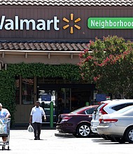 A benchmark measure of inflation slowed in July after surging in the previous month. Pictured is a Walmart store on August 04, in Rohnert Park, California. The retail giant recently issued a rare profit warning.
Mandatory Credit:	Justin Sullivan/Getty Images