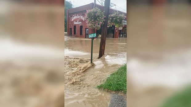 A view of a flooded street in front of the Kentucky Mist Distillery, following a day of heavy rain, in Whitesburg, Kentucky, on July 28, 2022.
Mandatory Credit:	Amber Elise Carter/Reuters