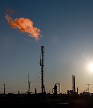 US natural gas prices have skyrocketed to levels unseen since 2008, a spike that threatens to offset the benefits of falling prices at the gas pump. Natural gas is flared off in the Permian Basin oil field on March 12 in Midland, Texas.
Mandatory Credit:	Joe Raedle/Getty Images