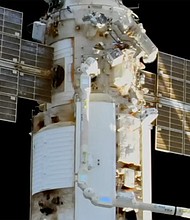 A Russian cosmonaut was ordered to return to the International Space Station's airlock because of an issue with his spacesuit.
Mandatory Credit:	NASA