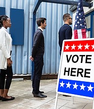 Group Of Young People Standing At The Entrance Of polling place.
Dreamstime