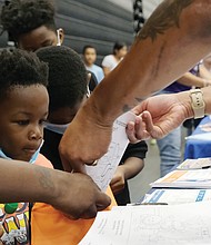 The Northside Coalition for Children’s 14th Annual Back to School Rally on Aug. 13 featured backpack giveaways, school supplies for teachers and students, food vendors and cheerleaders to wish students, families and teachers a successful new school year. The event took place at Liberation Church on Midlothian Turnpike.