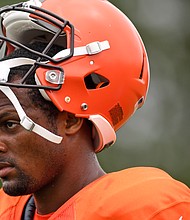 On August 10, the Cleveland Browns announced Deshaun Watson would be starting their preseason opener, despite facing a suspension for sexual misconduct allegations. Watson looks on during pre-season training.
Mandatory Credit:	Nick Cammett/Getty Images