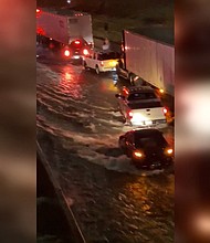 This image shows flooding on I-30 in downtown Dallas, Monday morning.
Mandatory Credit:	Cassondra Anna Mae Stewart