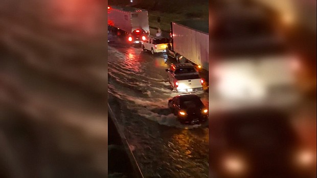 This image shows flooding on I-30 in downtown Dallas, Monday morning.
Mandatory Credit:	Cassondra Anna Mae Stewart