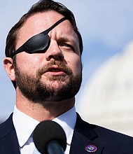 Republican Rep. Dan Crenshaw of Texas, seen here in December 2021, criticized the Department of Justice on August 21 for executing a search warrant on former President Donald Trump's Florida home earlier this month.
Mandatory Credit:	Tom Williams/CQ-Roll Call, Inc./Getty Images