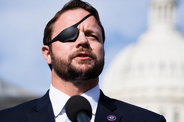 Republican Rep. Dan Crenshaw of Texas, seen here in December 2021, criticized the Department of Justice on August 21 for executing a search warrant on former President Donald Trump's Florida home earlier this month.
Mandatory Credit:	Tom Williams/CQ-Roll Call, Inc./Getty Images