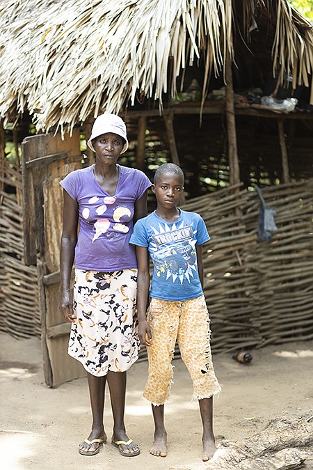 A potential beneficiary and her child stands outside their home. Hope For Haitians’ 21st annual “An Evening in the Tropics” will raise funds to support the construction of a village in Acul-Samedi, located in the commune of Fort-Liberté. The life-changing effort will provide safe, secure homes with sanitation for 75 families. Photo/Food For The Poor