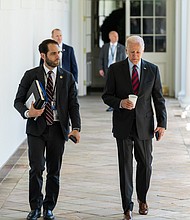 President Joe Biden and his personal aide Stephen Goepfert walk along the Colonnade of the White House, June 2, to the Oval Office. Goepfert is set to leave the White House for a role at the Transportation Department.
Mandatory Credit:	Cameron Smith/White House