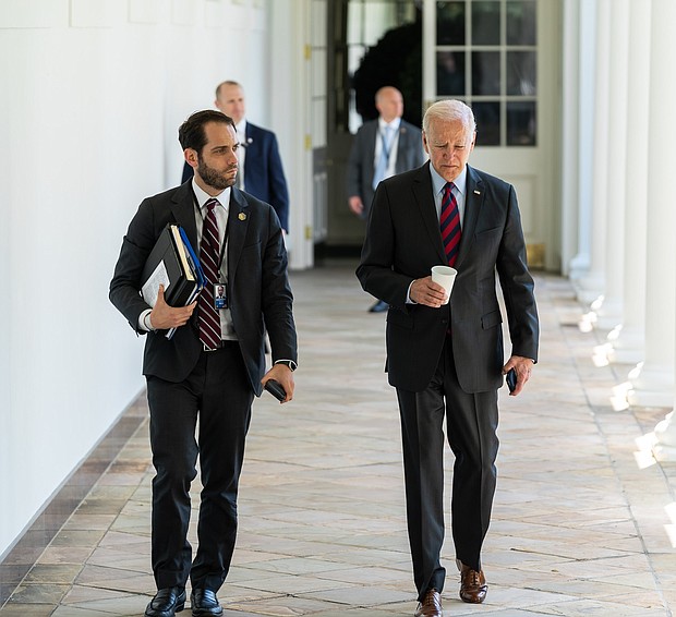 President Joe Biden and his personal aide Stephen Goepfert walk along the Colonnade of the White House, June 2, to the Oval Office. Goepfert is set to leave the White House for a role at the Transportation Department.
Mandatory Credit:	Cameron Smith/White House