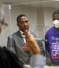 An off-duty New York City correction officer accused of fatally shooting a teenager in the face was indicted on murder and manslaughter charges on August 22. Dion Middleton, right, is seen here at the Bronx Criminal court on July 22.
Mandatory Credit:	David Dee Delgado/The New York Times/Redux