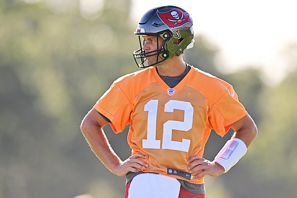 "Missed you guys." Tom Brady returned to the Tampa Bay Buccaneers' training camp on Monday following an 11-day leave of …