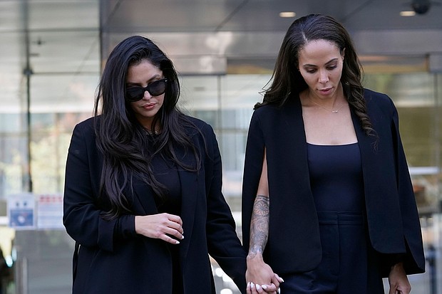 Vanessa Bryant, left, is seen leaving the federal courthouse in Los Angeles on August 19. Closing arguments are underway August 23 in Bryant's civil rights lawsuit against Los Angeles County that is centered on the photos taken by first responders of the helicopter crash site that killed her husband, NBA legend Kobe Bryant, and daughter Gianna, along with seven others.
Mandatory Credit: Damian Dovarganes/AP