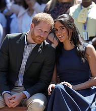 Meghan, Duchess of Sussex, right, has said she did not realize ambition could be considered a "terrible" quality in a woman until she started dating her future husband, Prince Harry.
Mandatory Credit:	Phil Noble/Getty Images